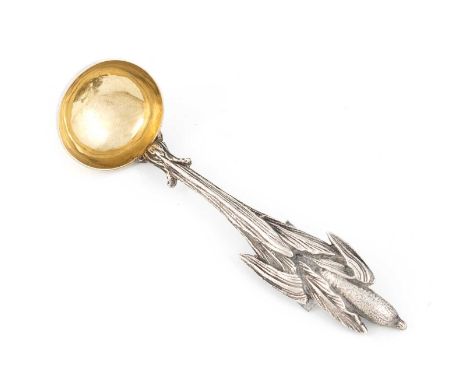 A Victorian silver cream ladle,by Edward Stockwell, London 1875,the handle modelled as a bullrush, with textured leaves, gild