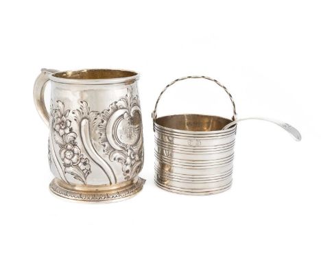 A George III silver swing-handled cream pail,by Edward Aldridge I, London 1762,with bands of reeded decoration, pierced swing