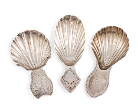 A collection of three George III silver Bright-cut caddy spoons, comprising: one by George Smith, London 1786, one by John Mc
