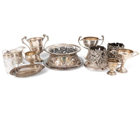 A mixed lot, comprising: an Irish silver trophy by T Weir &amp; Sons, Dublin 1934, plus four other silver trophies, a cream j