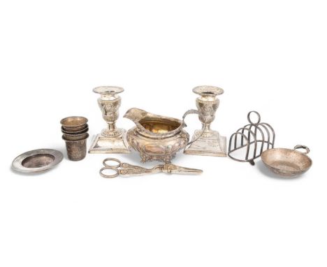 A mixed lot of silver items,comprising: a pair of Victorian silver candlesticks by Harrison Brothers &amp; Howson, Sheffield 