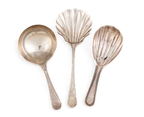 A collection of three George III silver caddy spoons, comprising: a Beaded pattern one, by Thomas Pratt and Arthur Humphreys,