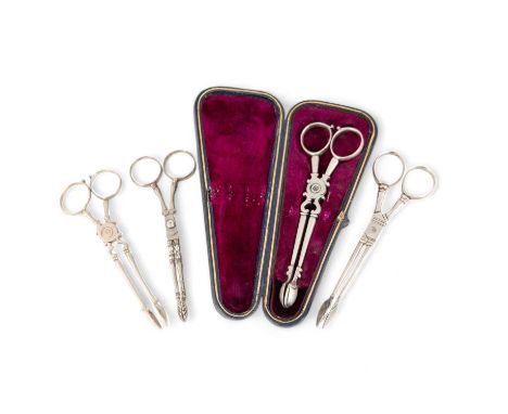 A collection of four pairs of early-18th century silver sugar nips, including an Irish pair, marks partially worn, of scissor