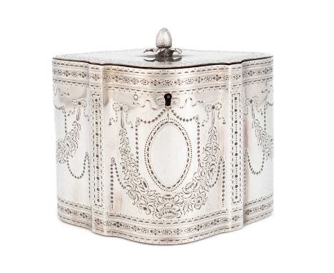 A George III silver tea caddy,by Robert Hennell, London 1783,shaped oval form, engraved decoration, flush-hinged cover with a