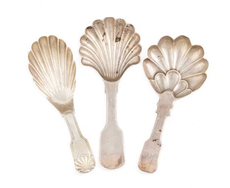 A small collection of three antique silver caddy spoons, comprising: a Fiddle, Thread and Shell one, by Joseph Taylor, Birmin
