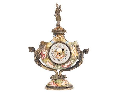 A late-19th century Austrian silver-gilt mounted enamel clock,probably Vienna,shaped circular form, winged mythical creatures