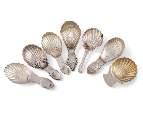 A collection of seven George III Sheffield-made silver caddy spoons, including two by Tudor and Leader, one 1778 and the othe
