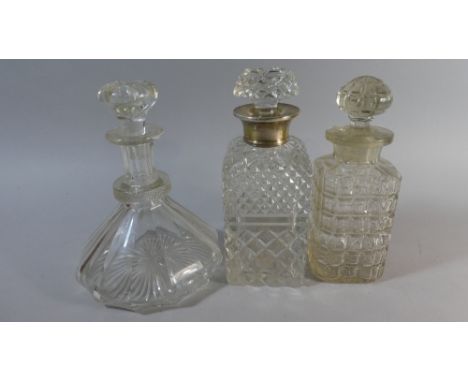 A Collection of Three Decanters to Include a Silver Collared Whisky Decanter and a Ships Decanter 