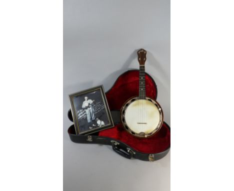 Beatles Memorabilia. A 1920s Banjo Ukelele 'The Gibson' in the UB2 Style but with Added Resonator. With Signed Photo of Alan 