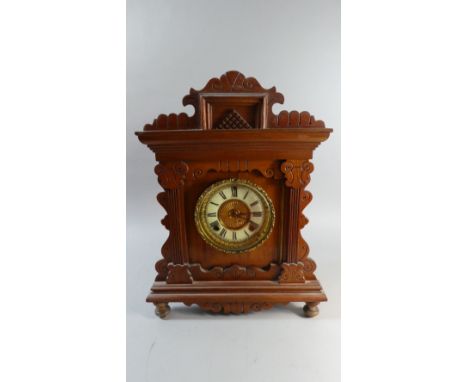 An American Gingerbread Clock by the Ansonia Clock Company, 47cm High 