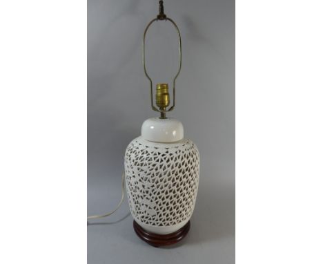 A White Glazed Ceramic Reticulated Table Lamp, 36cm High 