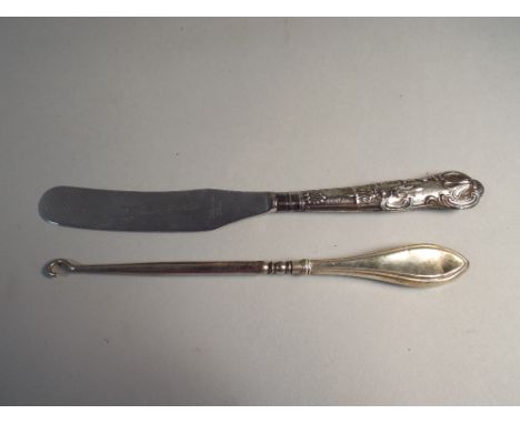A Silver Handled Button Hook and Butter Knife 