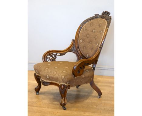 A Victorian carved rosewood button back parlour chair, with carved cabriole front supports, 97 x 72cm