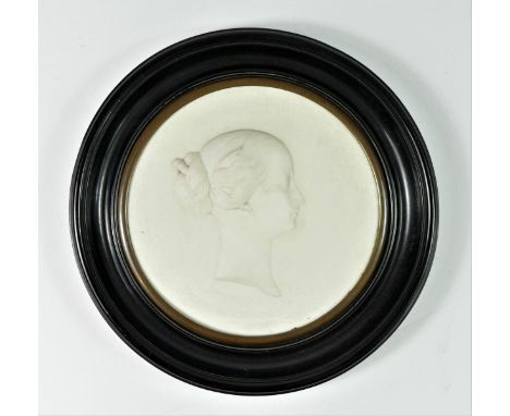 A 19th Century white bisque porcelain portrait plaque of Empress Eugenie, c. 1865, by J. Peyre for Sevres,   impressed 'J.PEY