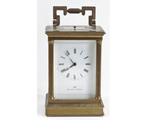 Matthew Norman, a gilt brass half hour striking and repeating carriage clock, white enamel dial with Roman numerals, the move