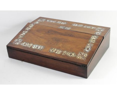 A 19th century rosewood writing slope with mother of pearl floral decoration to the hinged top, opening to reveal a purple le