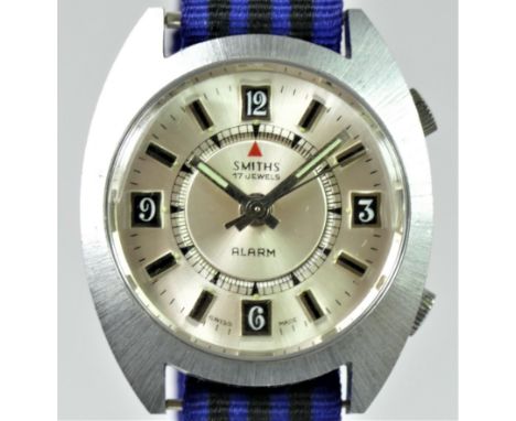Smiths alarm, a stainless steel manual wind gentleman's wristwatch, the 4 o'clock button rotating the inner section of the di