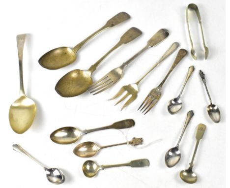 A quantity of hallmarked silver and white metal flatware to include a Victorian 1880 fork, various tea spoons, small ladle, a