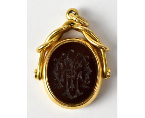 An 18ct yellow gold fob, oval bloodstone with intaglio initials to one side and classical scene verso, approx 10.5g.