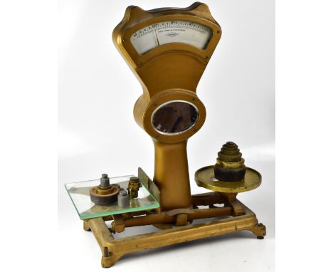 A pair of large shop counter scales, painted metal in gold metallic, scales in ounces, price per lb in pence and shillings, w