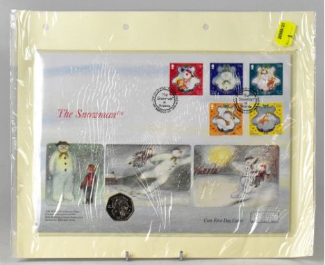 A 2003 Isle of Man 'The Snowman' Christmas coin first day cover featuring an encapsulated 'The Snowman and James' Christmas 5