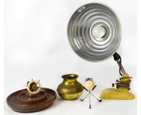 A collectors' lot comprising a Pifco table lamp with adjustable arm in cream, together with a brass nutcracker in the form of