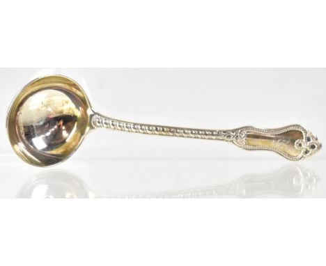 A Victorian hallmarked silver sauce ladle with beaded stem and rope finial, London 1863, approx 2.7ozt.