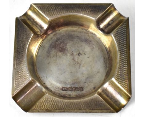 A Elizabeth II hallmarked silver cigar ashtray of canted square form with engine turned decoration, Edward Viner, Sheffield 1