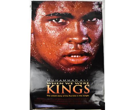 MUHAMMAD ALI; a double-sided poster signed by the legend and with a heart, rolled.We have not authenticated these signatures,
