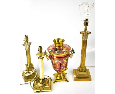 A brass table lamp in the form of a Corinthian column, on a square stepped base, a similar smaller example and a hexagonal br