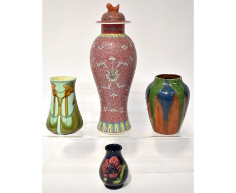 A Minton Art Nouveau Secessionist vase with tube lined decoration in greens and browns, factory mark to base, height 14cm (af