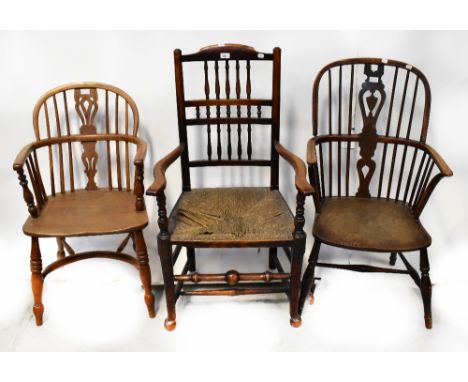 Three 19th century country chairs to include a carver with turned supports to back to outswept arms with ring turned supports