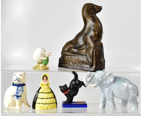 ROYAL DOULTON; a large stoneware figure of seal on naturalistic rocky plinth, 21 x 14cm, a Royal Doulton figure of a blue ele