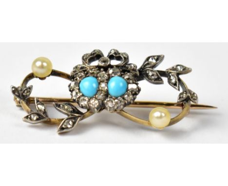 A yellow metal brooch in the form of a pair of hearts, each set with turquoise to the centre in a surround of diamonds surmou