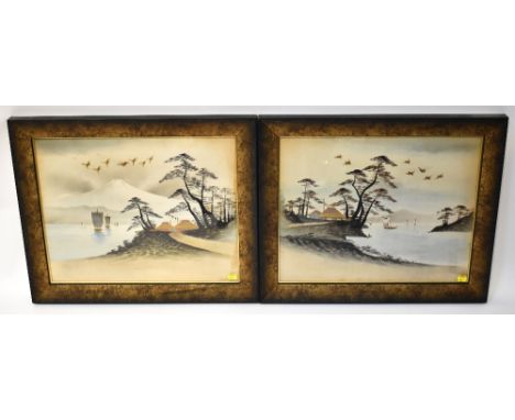 A pair of early 20th century Japanese watercolours, both depicting buildings by a lakeside, one with Mount Fuji in the distan