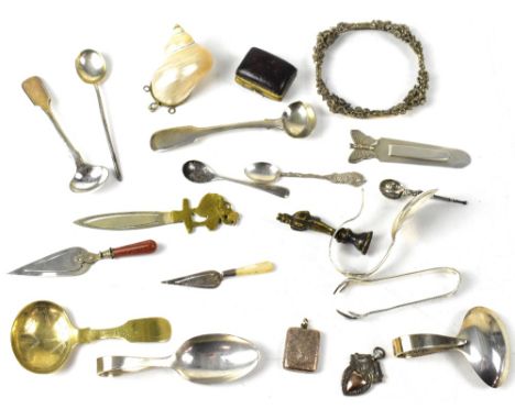 A mixed lot of hallmarked silver, white metal and yellow metal items to include caddy spoons, small sauce ladles, mustard spo