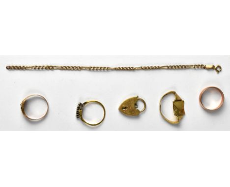 Various items of gold jewellery to include a 9ct rose gold band ring, size M, a 9ct gold heart clasp, a 9ct gold four-stone i