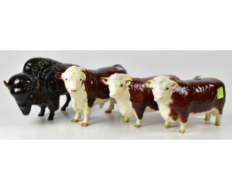 BESWICK; three figures of bulls to include a Hereford, First of Champions, marked to base Beswick and Ch of Champions, two ot