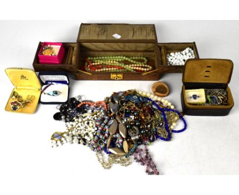 A quantity of mainly costume jewellery to include faux pearl necklaces, various other bead and crystal necklaces, a small cor