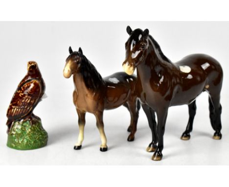 BESWICK; two models of ponies, 'Exmoor Heatherman', 17 x 20cm and a foal, also a miniature eagle decanter with White &amp; Ma