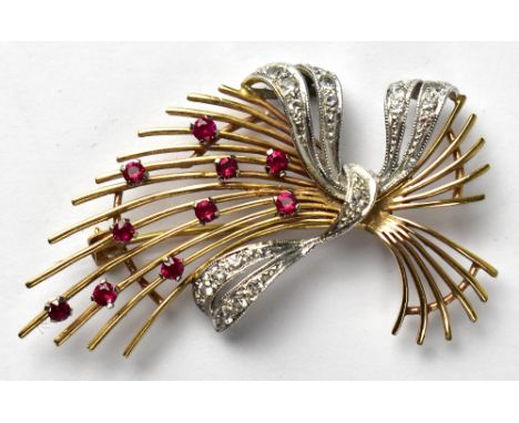 A 20th century 9ct gold and ruby cluster brooch, the 9ct gold wheatsheaf with ten small claw mounted rubies and tied with a 9