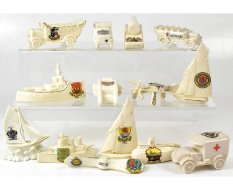 A group of crested ware from various factories to include a Victoria China sailing boat from Rhyl, a Savoy China model of a c