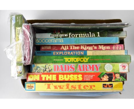 Eleven vintage boardgames comprising two copies of Waddingtons 'Totopoly', one copy with a separate large board, also 'Explor