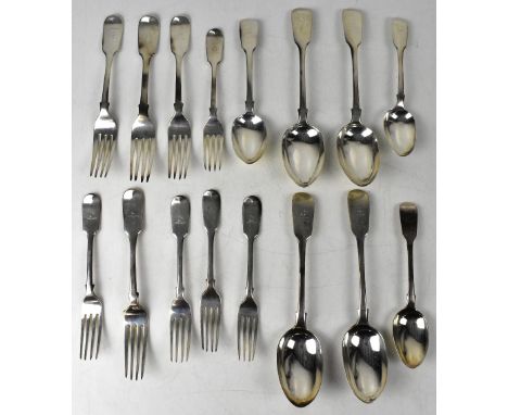 A group of sixteen 19th century hallmarked silver Fiddle pattern cutlery, each with coat of arms resembling a star above a cr