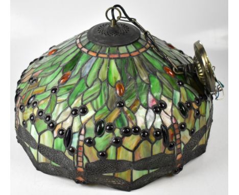 A large Tiffany-style ceiling light, all-over leaf and cabochon jewelled decoration, with rim of elegant metal raised dragonf