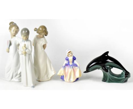 A Royal Doulton figure, HN1678, 'Dinky Do', height 11.5cm, a Poole model of a dolphin in green and black colourway, stamp mar