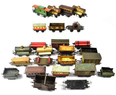 Various O gauge railway carriages, wagons, and trucks to include a Hornby NYC carriage no.2528, a Hornby Pratts Motor Spirit 