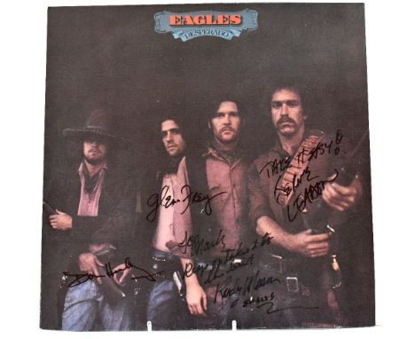 EAGLES; a 'Desperado' 33rpm record with inscription and bearing various signatures to the sleeve.We have not authenticated th