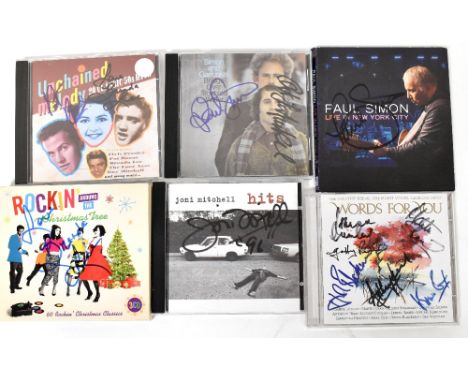 VARIOUS ARTISTS; six CDs bearing various signatures including Joni Mitchell, Paul Simon and Simon & Garfunkel (6).We have not