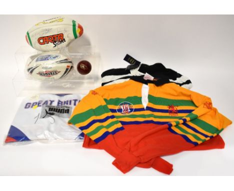 Various items of sporting memorabilia to include a Keighley Cougars signed rugby ball, a signed Carnegie rugby ball, a signed